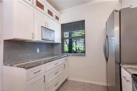 Kitchen - 328 Bradstrom Cir #E102, Naples, FL 34113 photo 4 of 5