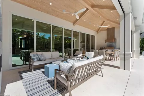 Exterior - 592 Pine Grove Ln, Naples, FL 34103 photo 4 of 12