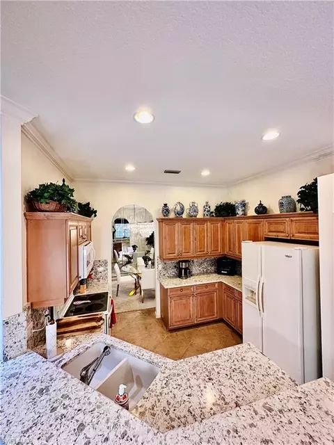 Kitchen - 16152 Parque Ln, Naples, FL 34110 photo 2 of 3