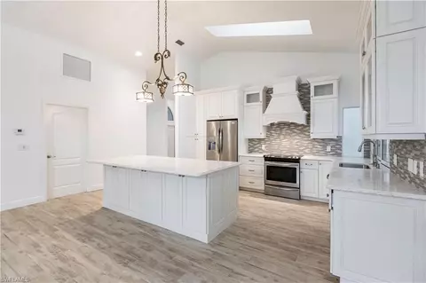 Kitchen - 1300 1310 Bald Eagle Dr, Naples, FL 34105 photo 2 of 8