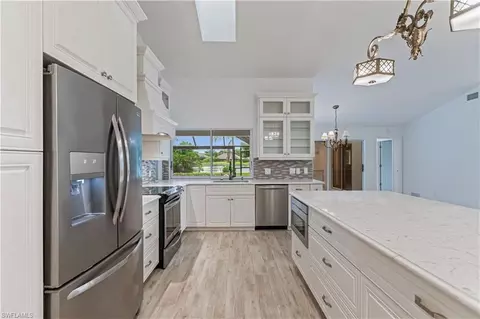 Kitchen - 1300 1310 Bald Eagle Dr, Naples, FL 34105 photo 5 of 8