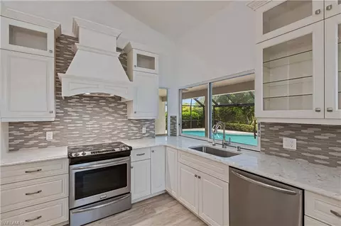 Kitchen - 1300 1310 Bald Eagle Dr, Naples, FL 34105 photo 7 of 8