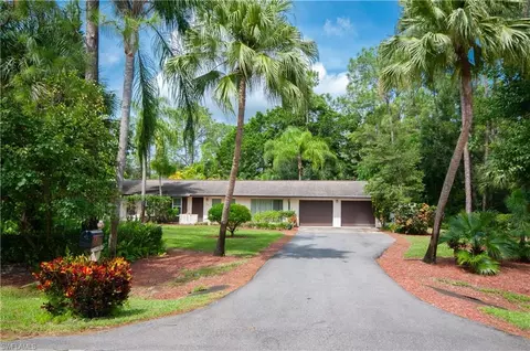 5875 Hidden Oaks Ln, Naples, FL 34119