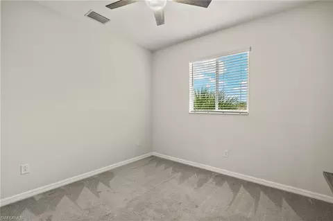 Bedroom - 10140 Tin Maple Dr #21, Estero, FL 33928 photo 5 of 7