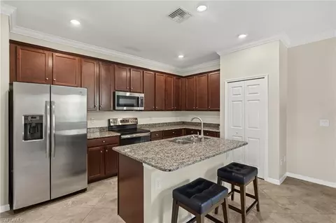 Kitchen - 10140 Tin Maple Dr #21, Estero, FL 33928 photo 2 of 2