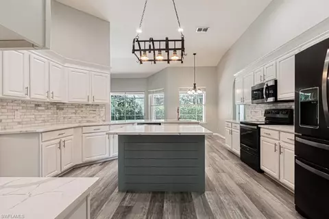 303 Burnt Pine Dr, Naples, FL 34119