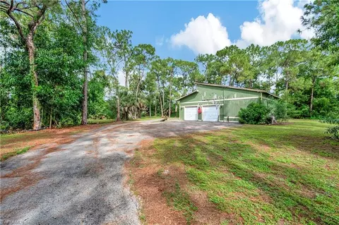 Exterior - 1511 Logan Ct, Naples, FL 34116 photo 5 of 8