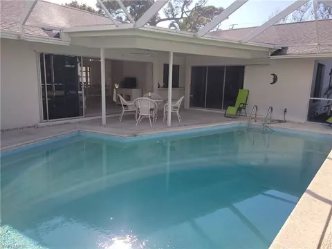 Exterior - 735 High Pines Dr, Naples, FL 34103 photo 4 of 6