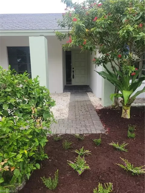 Exterior - 735 High Pines Dr, Naples, FL 34103 photo 2 of 6