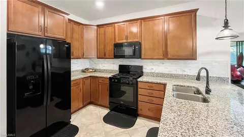 Kitchen - 7702 Jacaranda Ln, Naples, FL 34114 photo 1 of 2