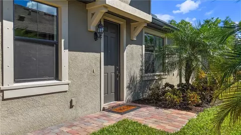 Exterior - 7702 Jacaranda Ln, Naples, FL 34114 photo 4 of 6
