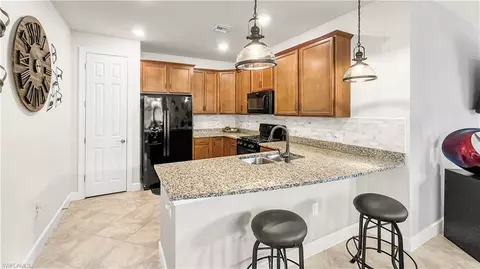 Kitchen - 7702 Jacaranda Ln, Naples, FL 34114 photo 2 of 2