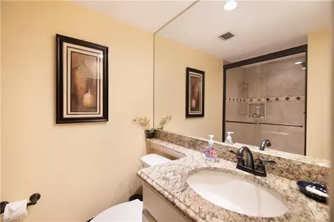 Bath - 37 High Point Cir E #107, Naples, FL 34103 photo 1 of 2