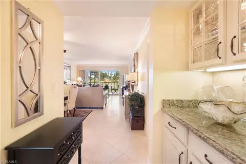 Entry Way - 37 High Point Cir E #107, Naples, FL 34103 photo 1 of 6