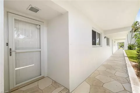 Entry Way - 37 High Point Cir E #107, Naples, FL 34103 photo 2 of 6