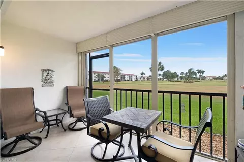 Exterior - 37 High Point Cir E #107, Naples, FL 34103 photo 2 of 9