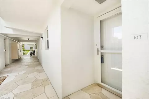 Entry Way - 37 High Point Cir E #107, Naples, FL 34103 photo 3 of 6