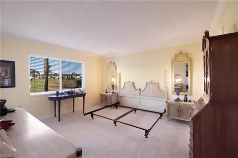 Bedroom - 37 High Point Cir E #107, Naples, FL 34103 photo 1 of 2