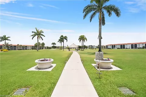 Exterior - 37 High Point Cir E #107, Naples, FL 34103 photo 7 of 9
