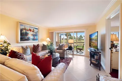 Living - 37 High Point Cir E #107, Naples, FL 34103 photo 2 of 2