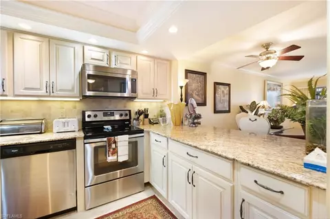 Kitchen - 37 High Point Cir E #107, Naples, FL 34103 photo 1 of 3