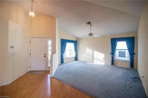 Living - 20781 Andiron Pl, Estero, FL 33928 photo 1 of 5
