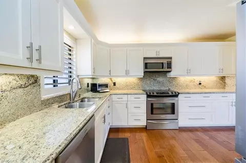 Kitchen - 770 Eagle Creek Dr #302, Naples, FL 34113 photo 3 of 3