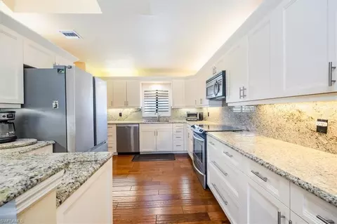 Kitchen - 770 Eagle Creek Dr #302, Naples, FL 34113 photo 2 of 3