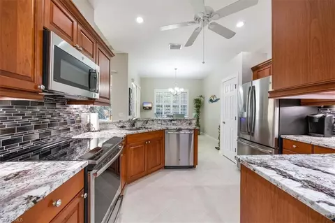 Kitchen - 16213 Parque Ln, Naples, FL 34110 photo 2 of 2