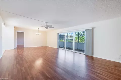 Living - 355 Palm Dr #1, Naples, FL 34112 photo 3 of 4