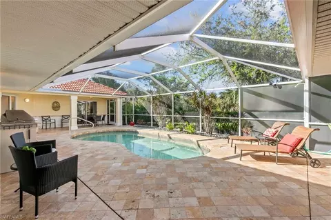 1515 Whispering Oaks Cir, Naples, FL 34110