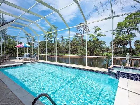 Exterior - 589 Eagle Creek Dr, Naples, FL 34113 photo 9 of 12