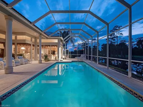 Exterior - 589 Eagle Creek Dr, Naples, FL 34113 photo 10 of 12