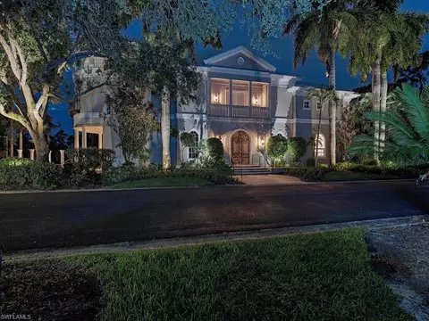Exterior - 589 Eagle Creek Dr, Naples, FL 34113 photo 4 of 12