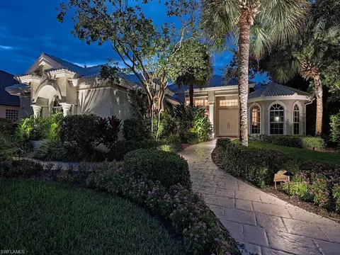 Exterior - 589 Eagle Creek Dr, Naples, FL 34113 photo 6 of 12