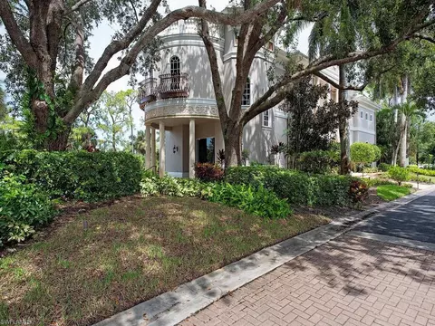 Exterior - 589 Eagle Creek Dr, Naples, FL 34113 photo 2 of 12