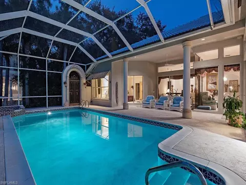 Exterior - 589 Eagle Creek Dr, Naples, FL 34113 photo 11 of 12