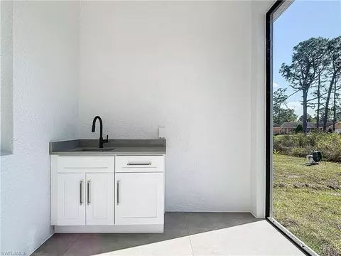 962 Iris St E, Lehigh Acres, FL 33974 photo 28