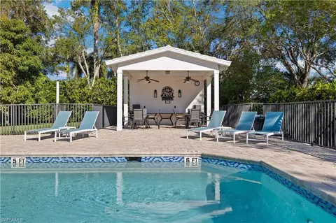 Exterior - 8526 Mustang Dr, Naples, FL 34113 photo 4 of 5