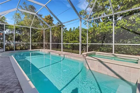 Exterior - 555 93rd Ave N, Naples, FL 34108 photo 5 of 6