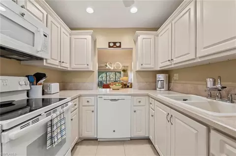 1055 Forest Lakes Dr #E209, Naples, FL 34105 photo 4