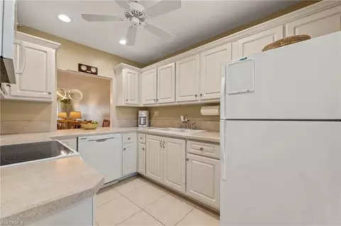 1055 Forest Lakes Dr #E209, Naples, FL 34105 photo 2