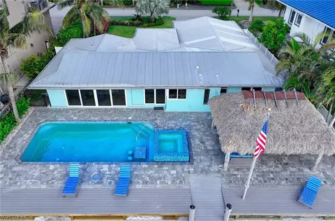 Exterior - 24 Pelican St E, Naples, FL 34113 photo 9 of 11