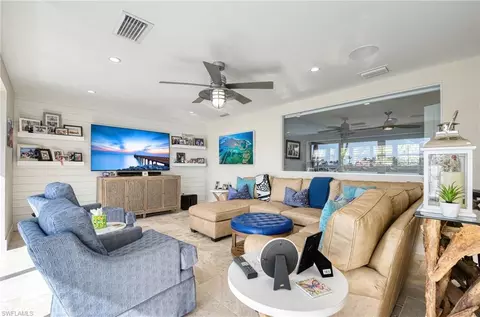 Living - 24 Pelican St E, Naples, FL 34113 photo 1 of 2