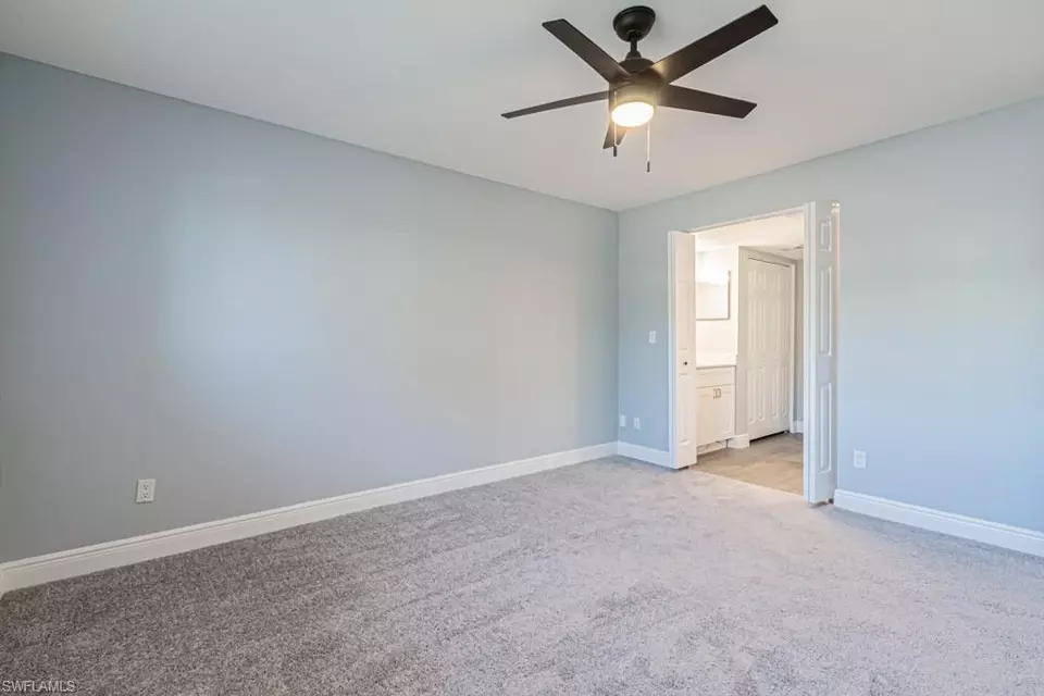 Bedroom - 5745 Foxlake Dr #D, North Fort Myers, FL 33917 photo 2 of 7