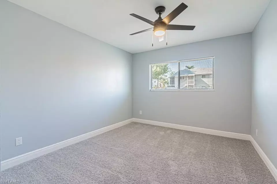 Bedroom - 5745 Foxlake Dr #D, North Fort Myers, FL 33917 photo 6 of 7