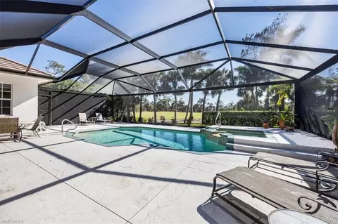 Exterior - 535 Eagle Creek Dr, Naples, FL 34113 photo 4 of 5