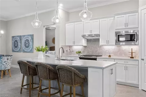 9387 Greyhawk Trl, Naples, FL 34120