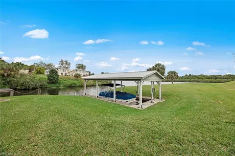Exterior - 1202 Seminole Cir, Moore Haven, FL 33471 photo 10 of 12