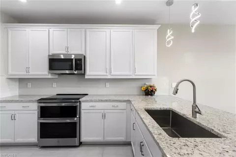 Kitchen - 7486 Rockefeller Dr, Naples, FL 34119 photo 3 of 4